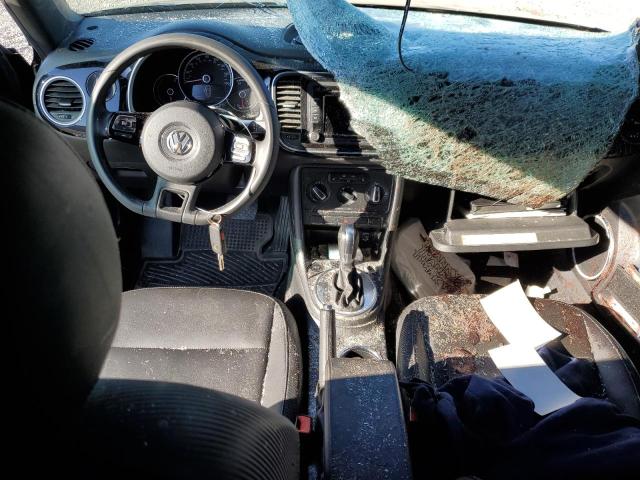 Photo 8 from auction – 2014 VOLKSWAGEN BEETLE with VIN 3VWJ07AT0EM661681