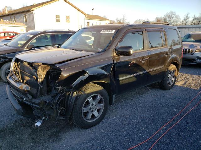 HONDA PILOT TOUR 2010 with VIN 5FNYF4H90AB016973 - Photo from auction