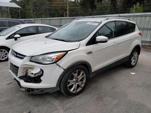 FORD ESCAPE TIT 2016 with VIN 1FMCU0JX9GUB51978 - Photo from auction