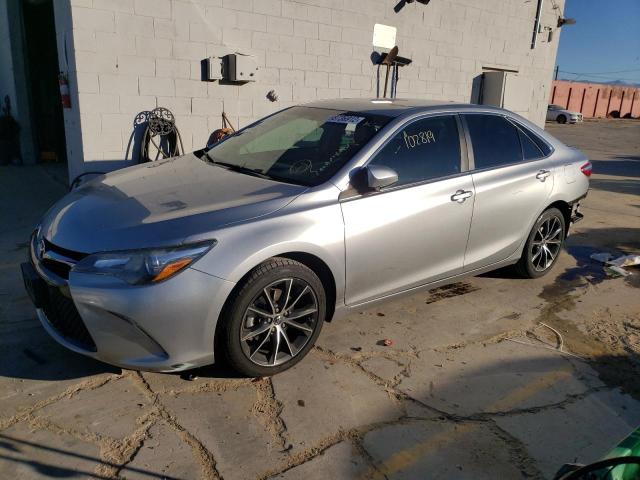 TOYOTA CAMRY LE 2015 with VIN 4T1BF1FK3FU019385 - Photo from auction