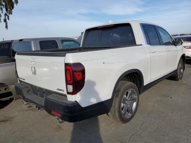 Photo 3 from auction – 2021 HONDA RIDGELINE with VIN 5FPYK3F50MB006414