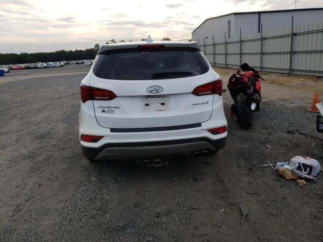 Photo 6 from auction – 2018 HYUNDAI SANTA FE S with VIN 5NMZU4LA6JH085483