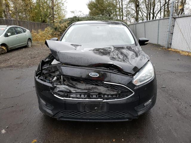 Photo 5 from auction – 2015 FORD FOCUS SE with VIN 1FADP3F20FL287506