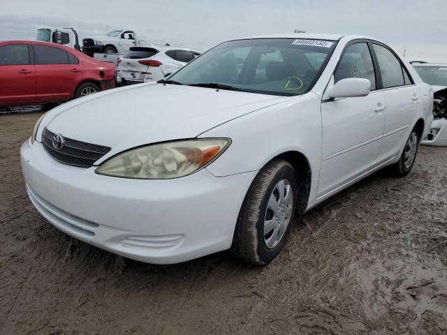 TOYOTA CAMRY LE 2003 with VIN 4T1BE32K33U209736 - Photo from auction