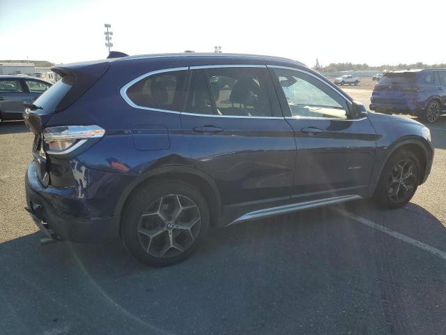 Photo 3 from auction – 2016 BMW X1 XDRIVE2 with VIN WBXHT3C37G5E49244