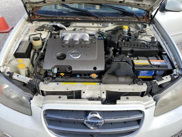 Photo 11 from auction – 2002 NISSAN MAXIMA GLE with VIN JN1DA31D82T444474
