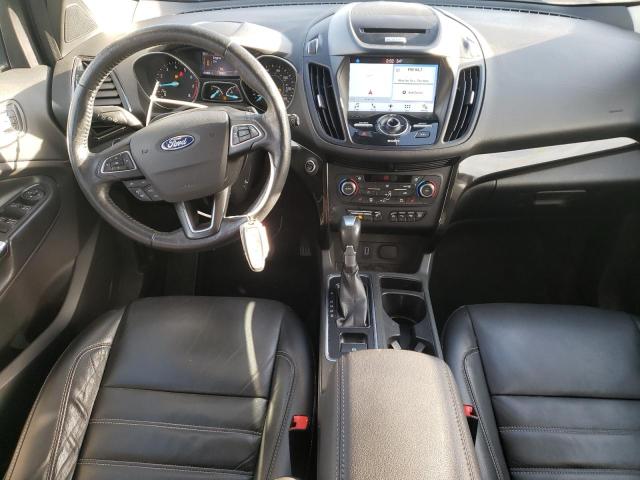 Photo 8 from auction – 2017 FORD ESCAPE TIT with VIN 1FMCU0J94HUC23611