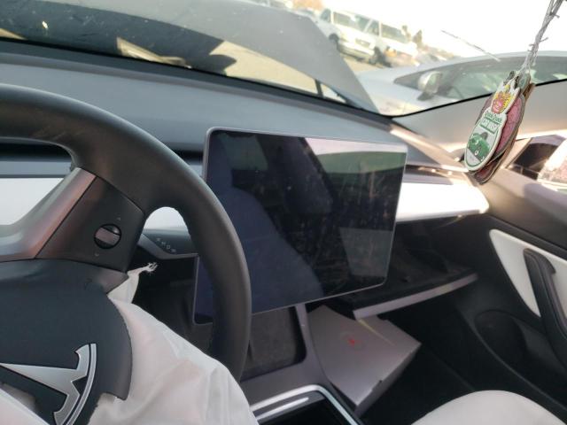 Photo 9 from auction – 2021 TESLA MODEL 3 with VIN 5YJ3E1EA9MF875090
