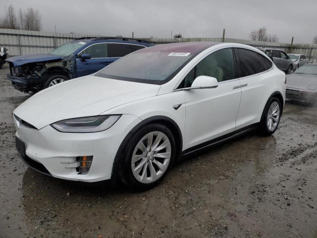 TESLA MODEL X 2020 with VIN 5YJXCAE24LF239384 - Photo from auction