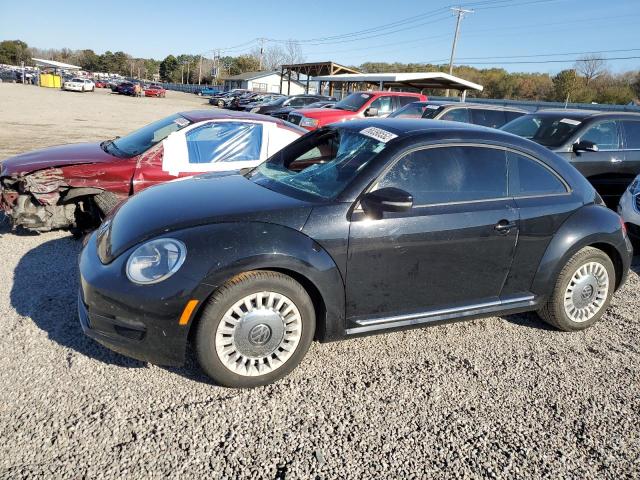 VOLKSWAGEN BEETLE 2014 with VIN 3VWJ07AT0EM661681 - Photo from auction
