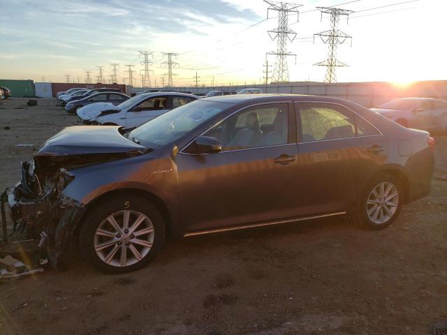 TOYOTA CAMRY HYBR 2014 with VIN 4T1BD1FK2EU100026 - Photo from auction