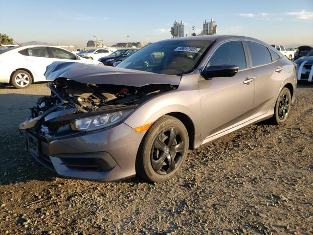 HONDA CIVIC LX 2018 with VIN 2HGFC2E52JH563387 - Photo from auction