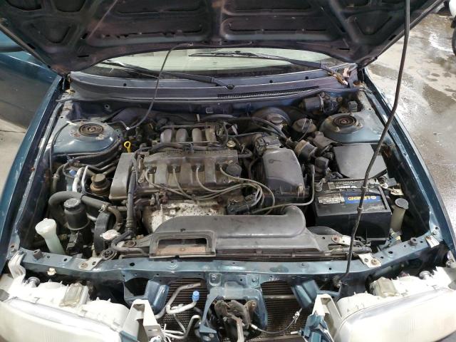 Photo 11 from auction – 1997 MAZDA 626 DX with VIN 1YVGE22C6V5656940