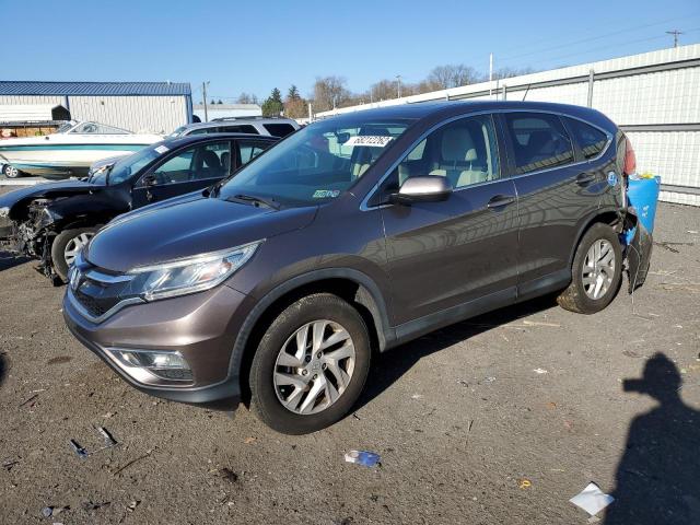 HONDA CR-V EX 2015 with VIN 2HKRM4H53FH635454 - Photo from auction