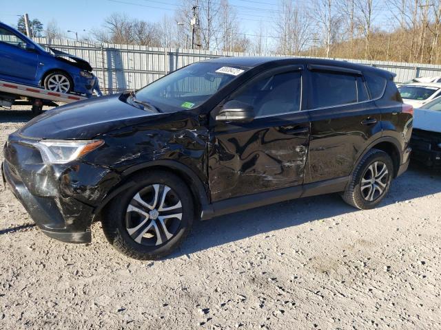 TOYOTA RAV4 LE 2018 with VIN 2T3BFREV4JW760011 - Photo from auction