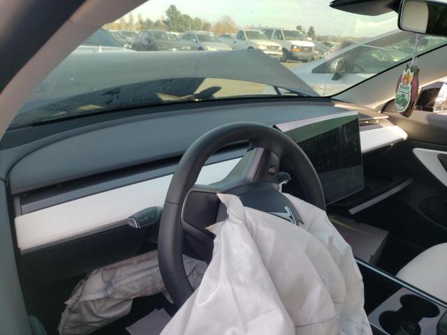 Photo 8 from auction – 2021 TESLA MODEL 3 with VIN 5YJ3E1EA9MF875090