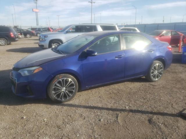 TOYOTA COROLLA L 2014 with VIN 5YFBURHE2EP084062 - Photo from auction
