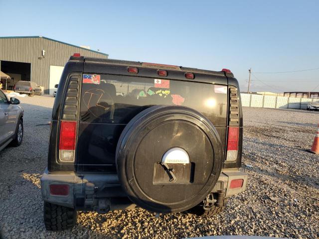 Photo 6 from auction – 2006 HUMMER H2 with VIN 5GRGN23UX6H101579