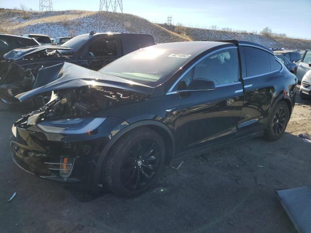 TESLA MODEL X 2018 with VIN 5YJXCDE26JF117060 - Photo from auction