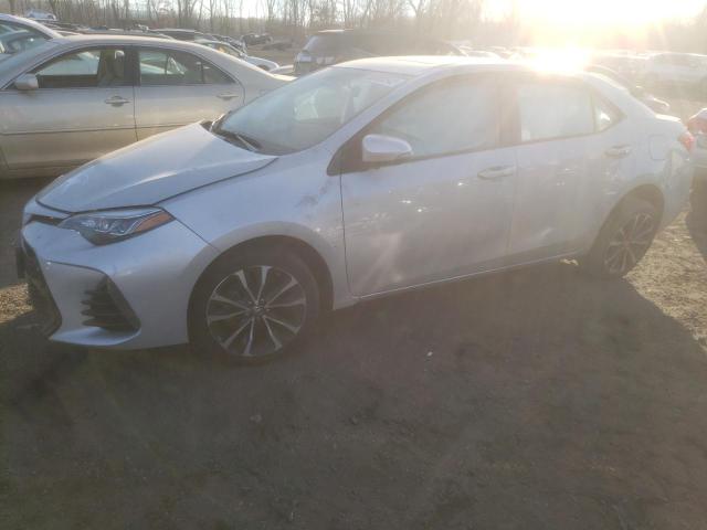 TOYOTA COROLLA L 2017 with VIN 2T1BURHE2HC827923 - Photo from auction