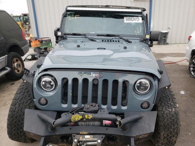 Photo 5 from auction – 2014 JEEP WRANGLER U with VIN 1C4BJWFG2EL156107