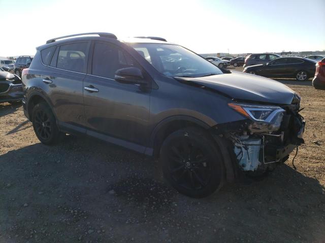 Photo 4 from auction – 2018 TOYOTA RAV4 LIMIT with VIN JTMDFREV3JD231719