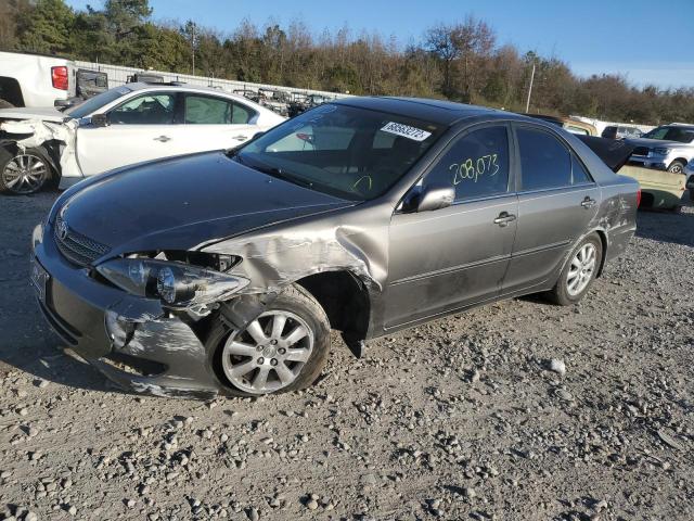 TOYOTA CAMRY LE 2002 with VIN JTDBE32K120071205 - Photo from auction
