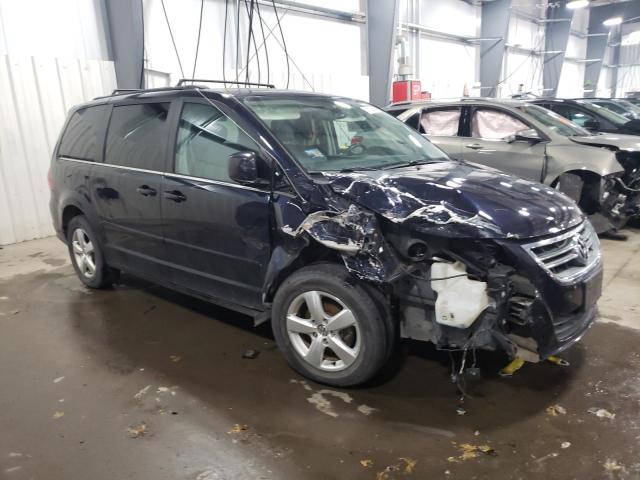 Photo 4 from auction – 2011 VOLKSWAGEN ROUTAN SE with VIN 2V4RW3DG2BR624136
