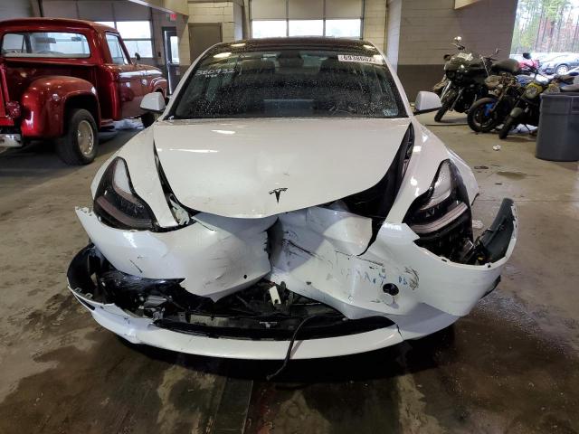 Photo 5 from auction – 2021 TESLA MODEL 3 with VIN 5YJ3E1EB9MF034847