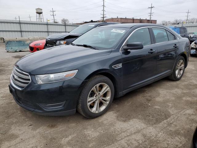 FORD TAURUS SEL 2014 with VIN 1FAHP2H8XEG124074 - Photo from auction