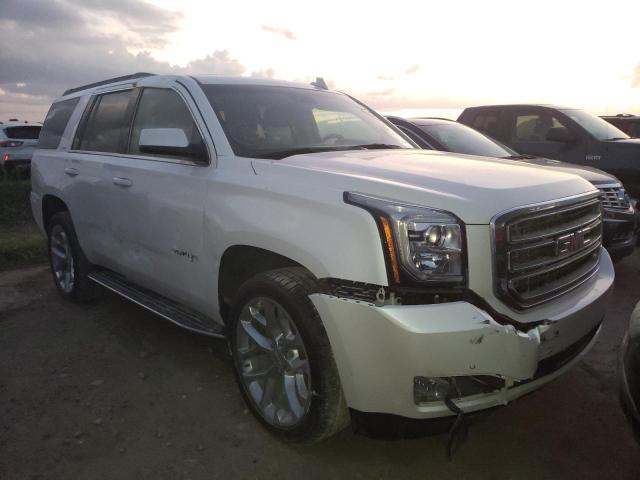 GMC YUKON SLT 2019 with VIN 1GKS2BKC0KR148657 - Photo from auction