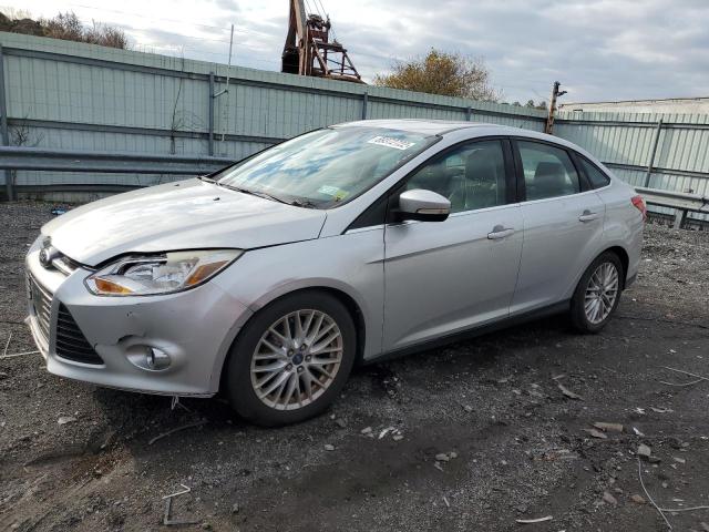 FORD FOCUS SEL 2012 with VIN 1FAHP3H27CL384695 - Photo from auction