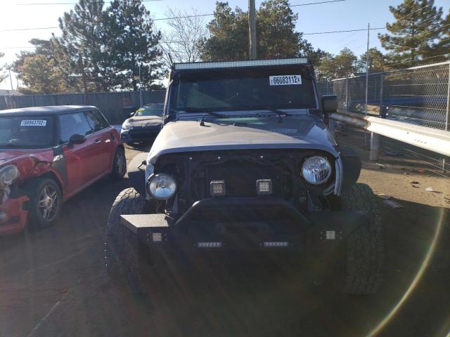 Photo 5 from auction – 2016 JEEP WRANGLER U with VIN 1C4BJWDG3GL126667
