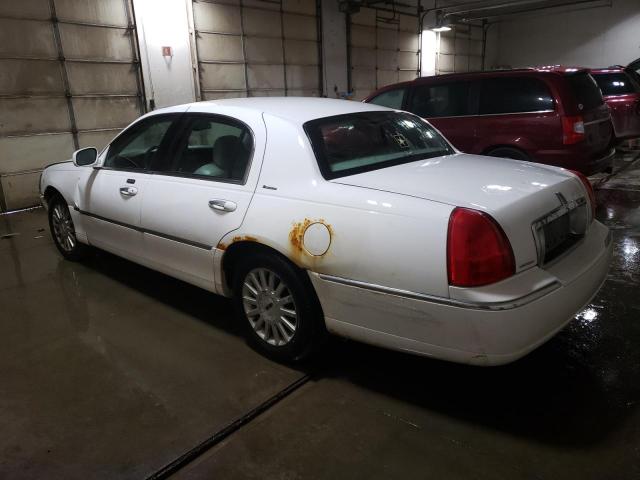 Photo 2 from auction – 2003 LINCOLN TOWN CAR E with VIN 1LNHM81W93Y624728