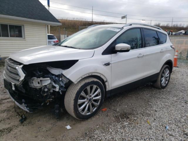 FORD ESCAPE TIT 2017 with VIN 1FMCU0JD9HUD36880 - Photo from auction