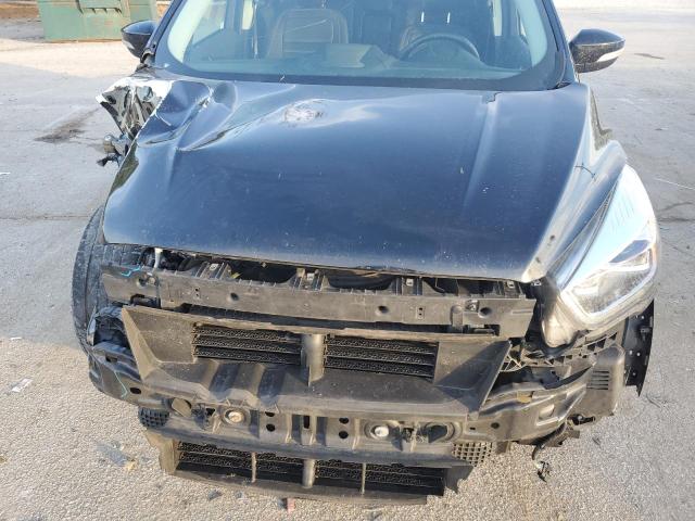Photo 12 from auction – 2018 FORD ESCAPE TIT with VIN 1FMCU0J90JUA60106