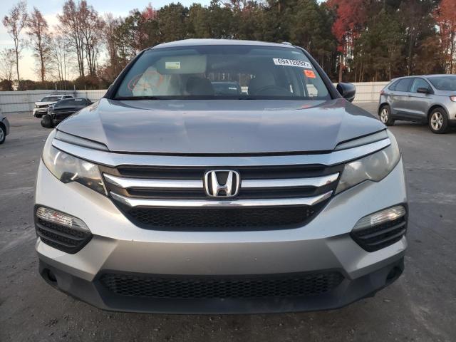 Photo 5 from auction – 2017 HONDA PILOT LX with VIN 5FNYF6H16HB056202