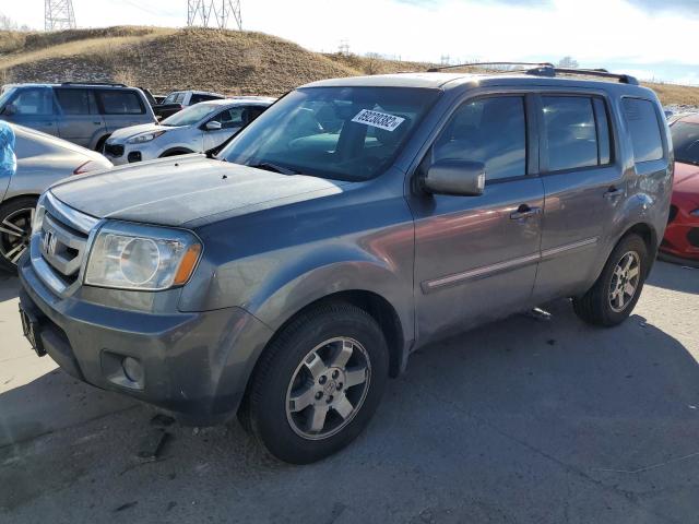 HONDA PILOT TOUR 2010 with VIN 5FNYF4H88AB015870 - Photo from auction
