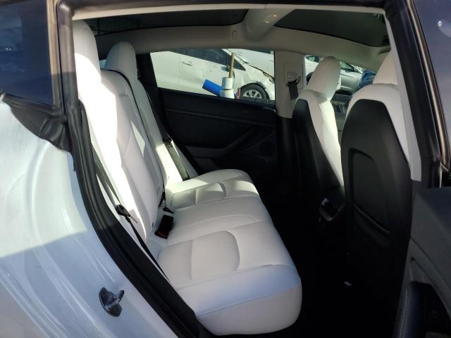 Photo 10 from auction – 2022 TESLA MODEL 3 with VIN 5YJ3E1EBXNF153654