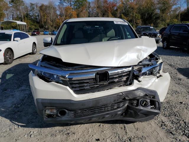 Photo 5 from auction – 2017 HONDA RIDGELINE with VIN 5FPYK2F66HB009097