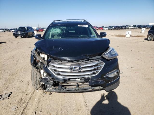 Photo 5 from auction – 2018 HYUNDAI SANTA FE S with VIN 5NMZU3LB4JH098574