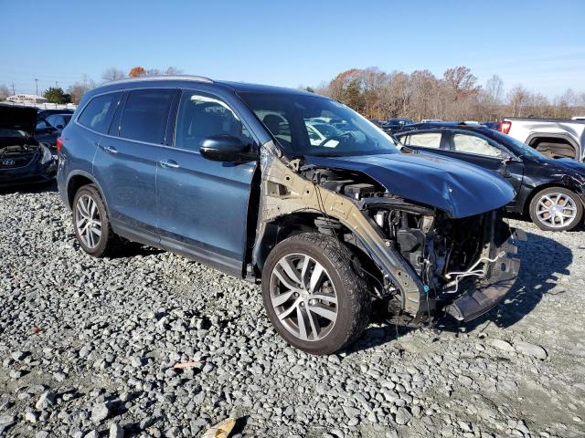 Photo 4 from auction – 2017 HONDA PILOT ELIT with VIN 5FNYF6H06HB021943