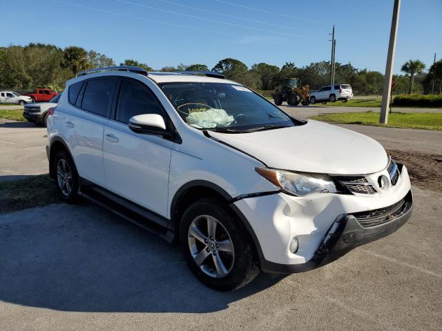 Photo 4 from auction – 2015 TOYOTA RAV4 XLE with VIN JTMWFREV6FJ049059