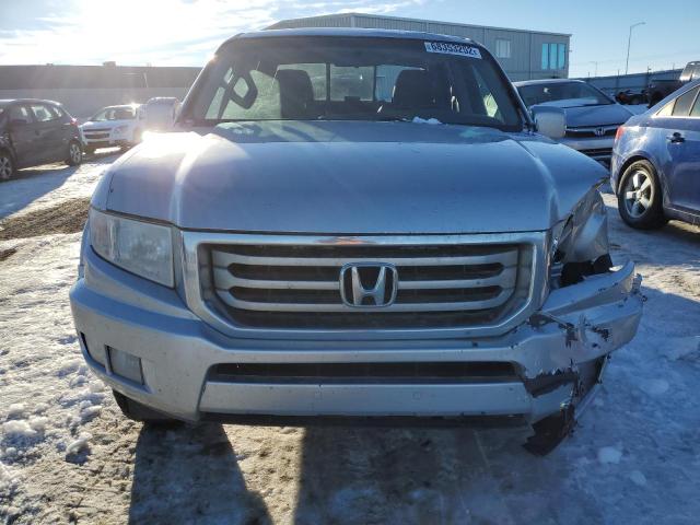 Photo 5 from auction – 2012 HONDA RIDGELINE with VIN 5FPYK1F53CB551316