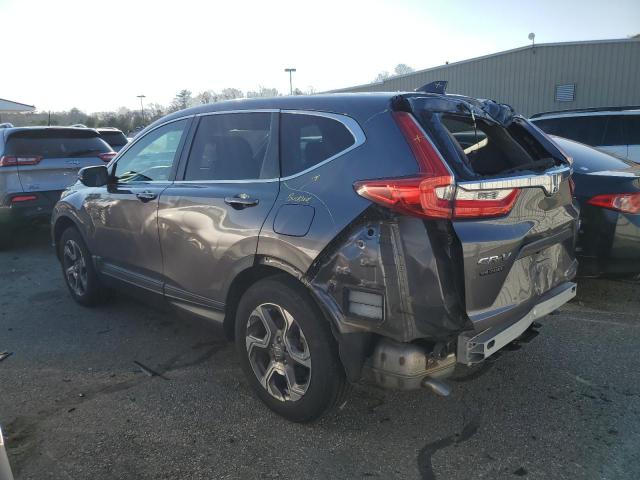 Photo 2 from auction – 2018 HONDA CR-V EX with VIN 7FARW2H51JE060328