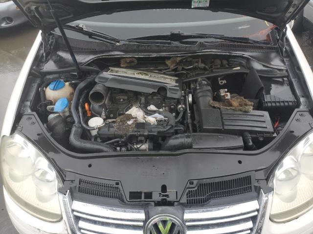 Photo 11 from auction – 2009 VOLKSWAGEN JETTA with VIN 3VWRA71K19M043492