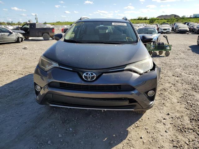 Photo 5 from auction – 2016 TOYOTA RAV4 XLE with VIN JTMWFREV0GJ098646