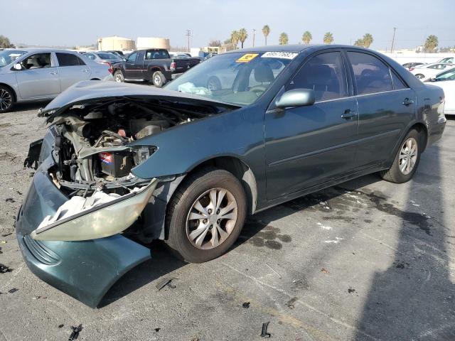 TOYOTA CAMRY LE 2004 with VIN 4T1BF32K14U069040 - Photo from auction