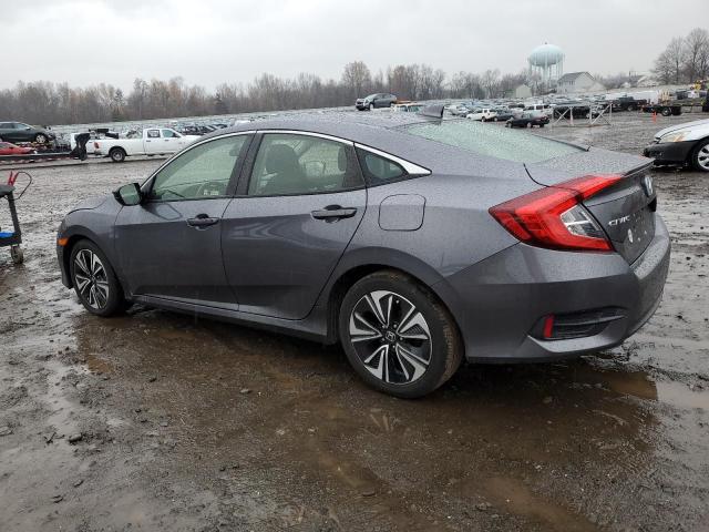 Photo 2 from auction – 2018 HONDA CIVIC EX with VIN JHMFC1F39JX040738