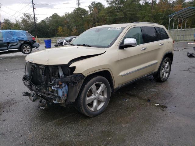 JEEP GRAND CHER 2011 with VIN 1J4RS6GG7BC659762 - Photo from auction